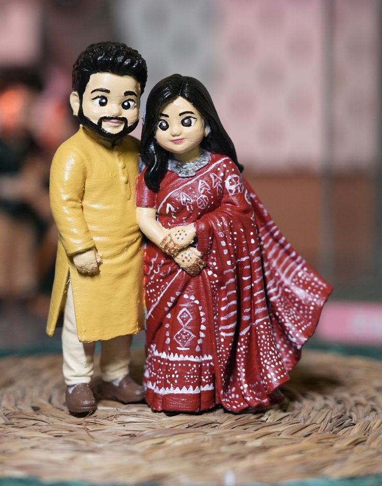 Handcrafted 3D miniature figurine of the same couple, made from their photo